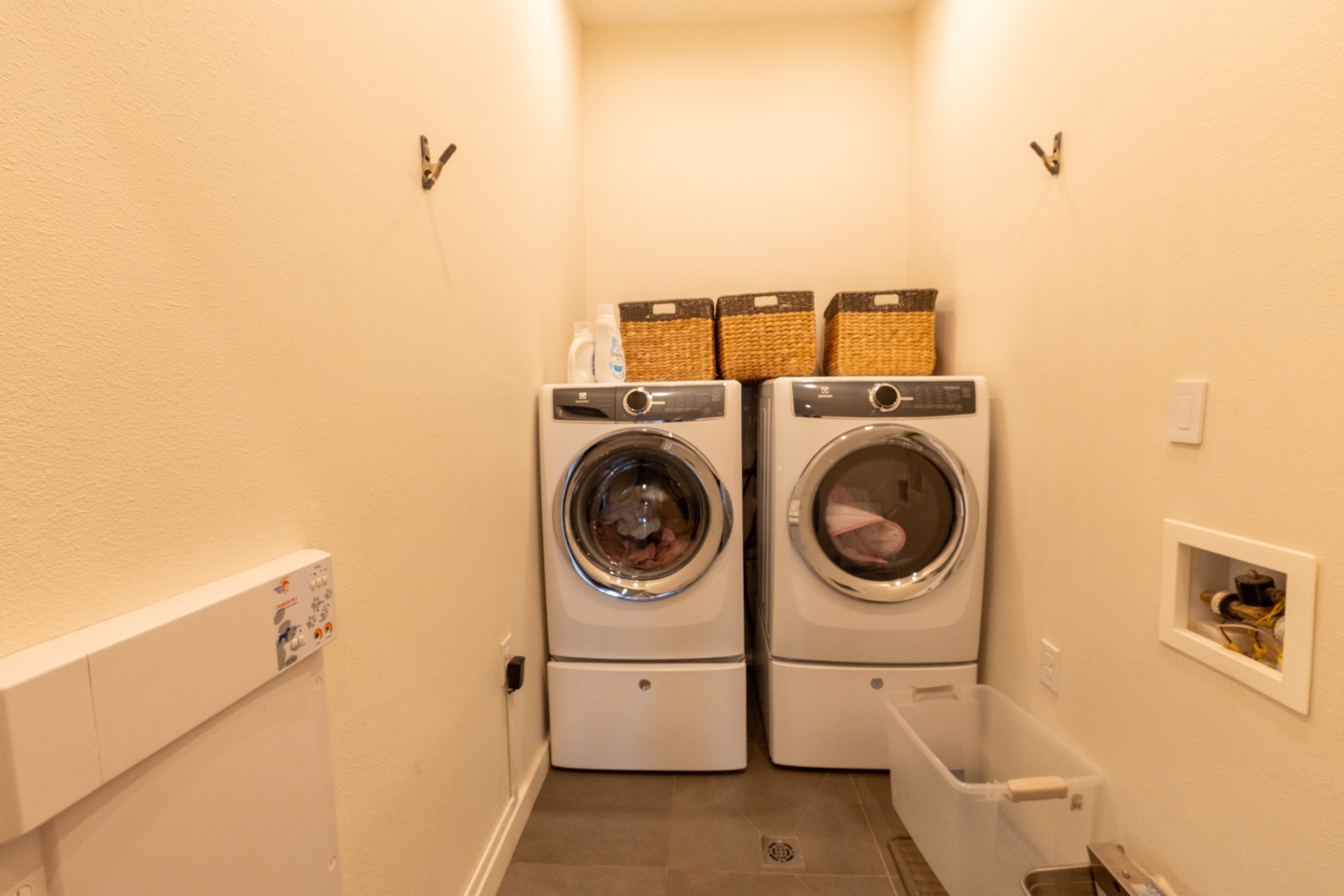 Guest House laundry room with full-size washer and dryer — Trinity Valley Ranch Deer, Coleman Texas